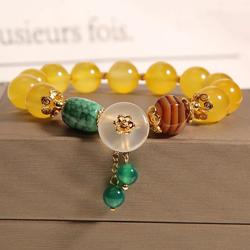 Yellow agate and crystal women's bracelet on gold silk cord with adjustable design