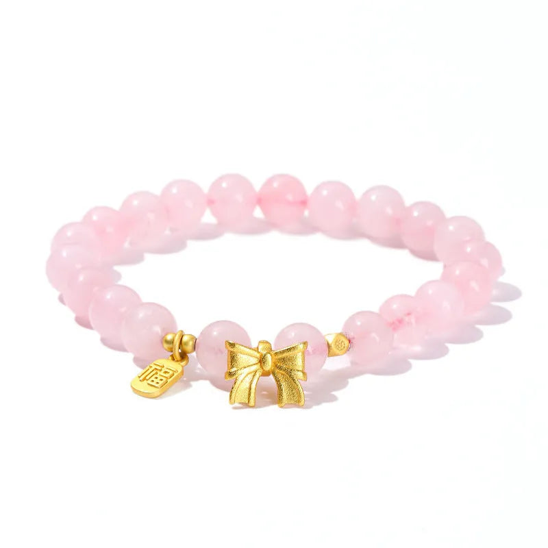 Handmade crystal agate bracelet with cute fruit and bow shapes on a white background