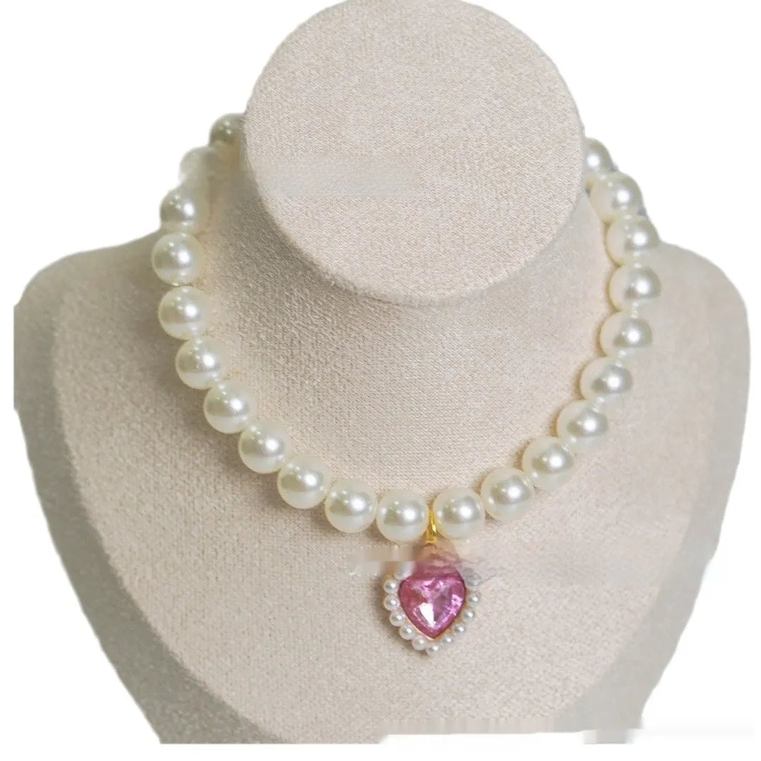 Pearl necklace love gem cat collar in single layer pink on a light background