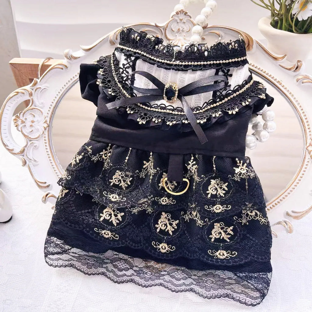 Golden Gothic princess-style skirt dress for a small dog or cat on a mannequin.
