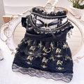 Golden Gothic princess-style skirt dress for a small dog or cat on a mannequin.