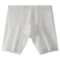 Men's transparent lace boxer shorts in light purple on a size chart, showing mid waist and lengthened leg design.