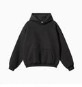 Man wearing a loose fit grey cotton terry hooded sweater with drop-shoulder sleeves.