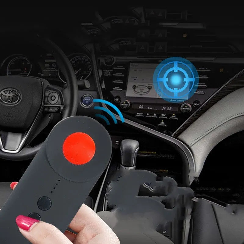 Black handheld GPS and hidden camera detector with USB port on a compact ABS plastic body.