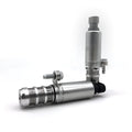 A pair of oil control solenoid valves for Buick and Chevrolet VVT systems.