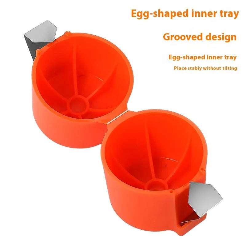 Stainless steel egg shell opener in orange red with PP plastic handle on a kitchen counter