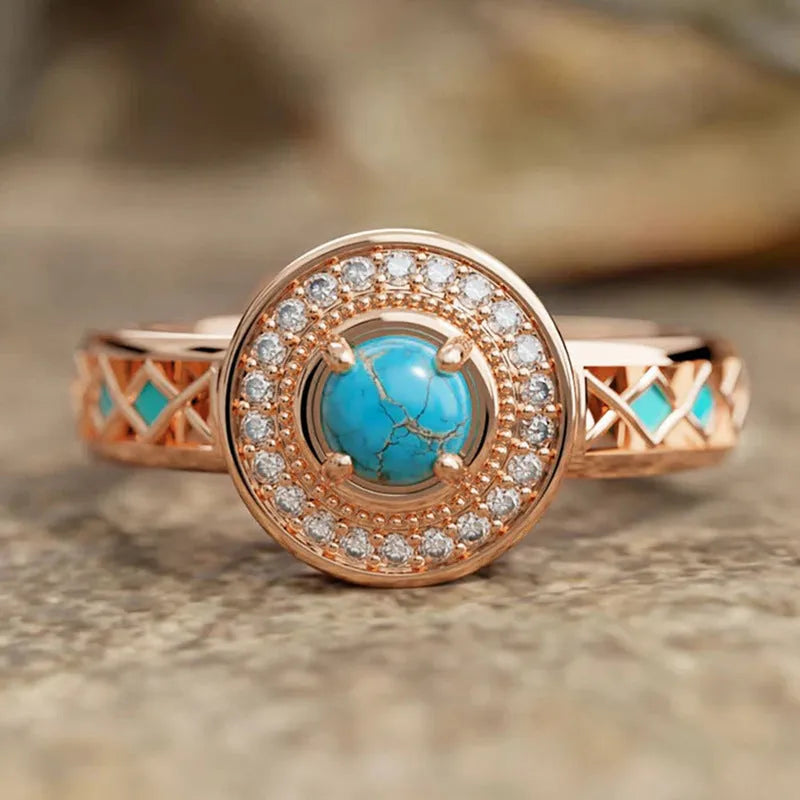 Women's ethnic geometric ring with turquoise accents and rose gold finish on copper