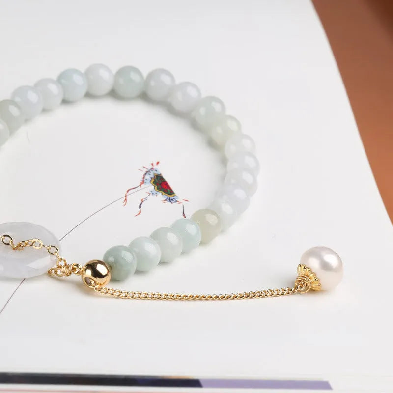 Traditional jade bracelet with peace buckle charm and pearl accents for women