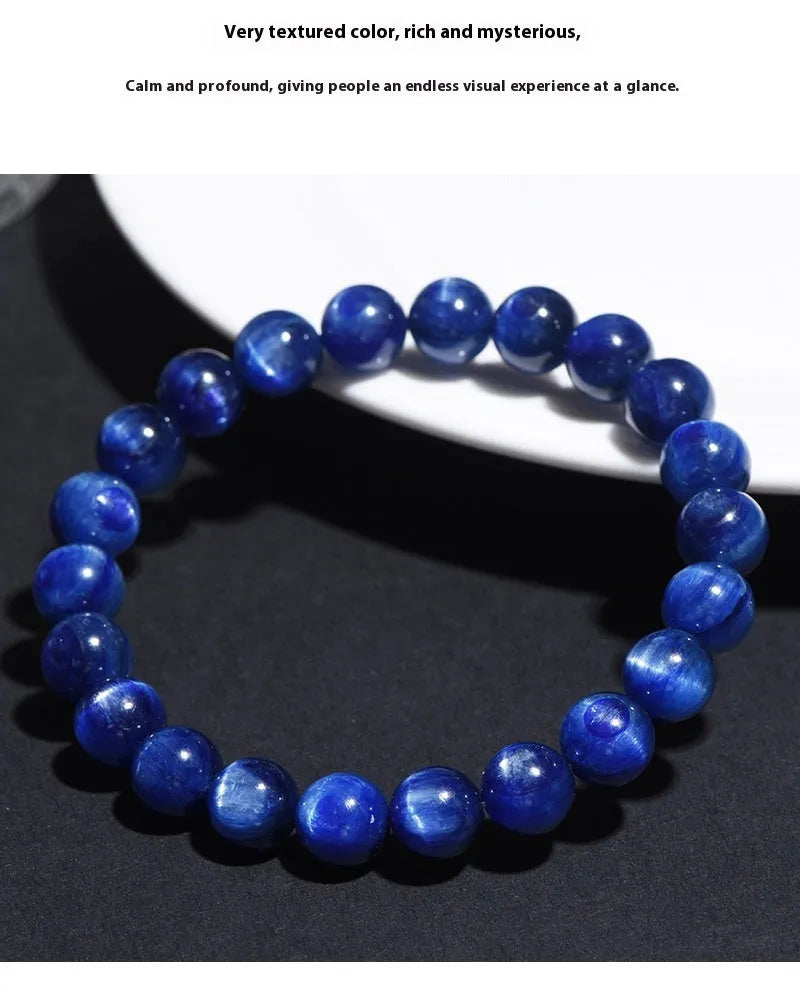 Natural grade 7A blue crystal ball bracelet with geometric beads and a Ruyi charm on a white background.