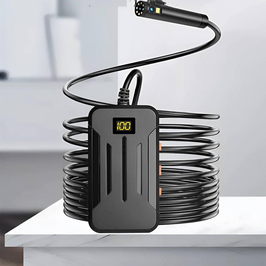 F300 WiFi dual lens endoscope inspection camera with magnet and hook accessories on a table