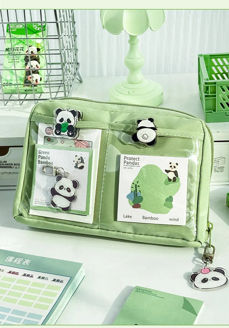 Green 12-layer canvas pencil case with panda motif and open layers showing pen storage