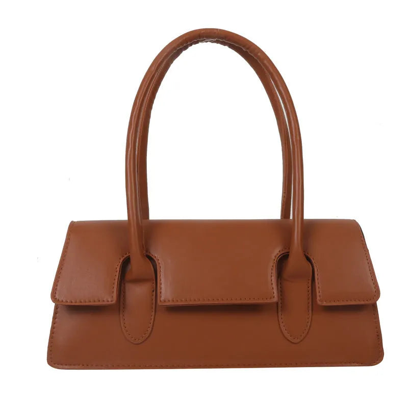 Women's retro style small square PU shoulder bag in black with visible stitching and a single strap
