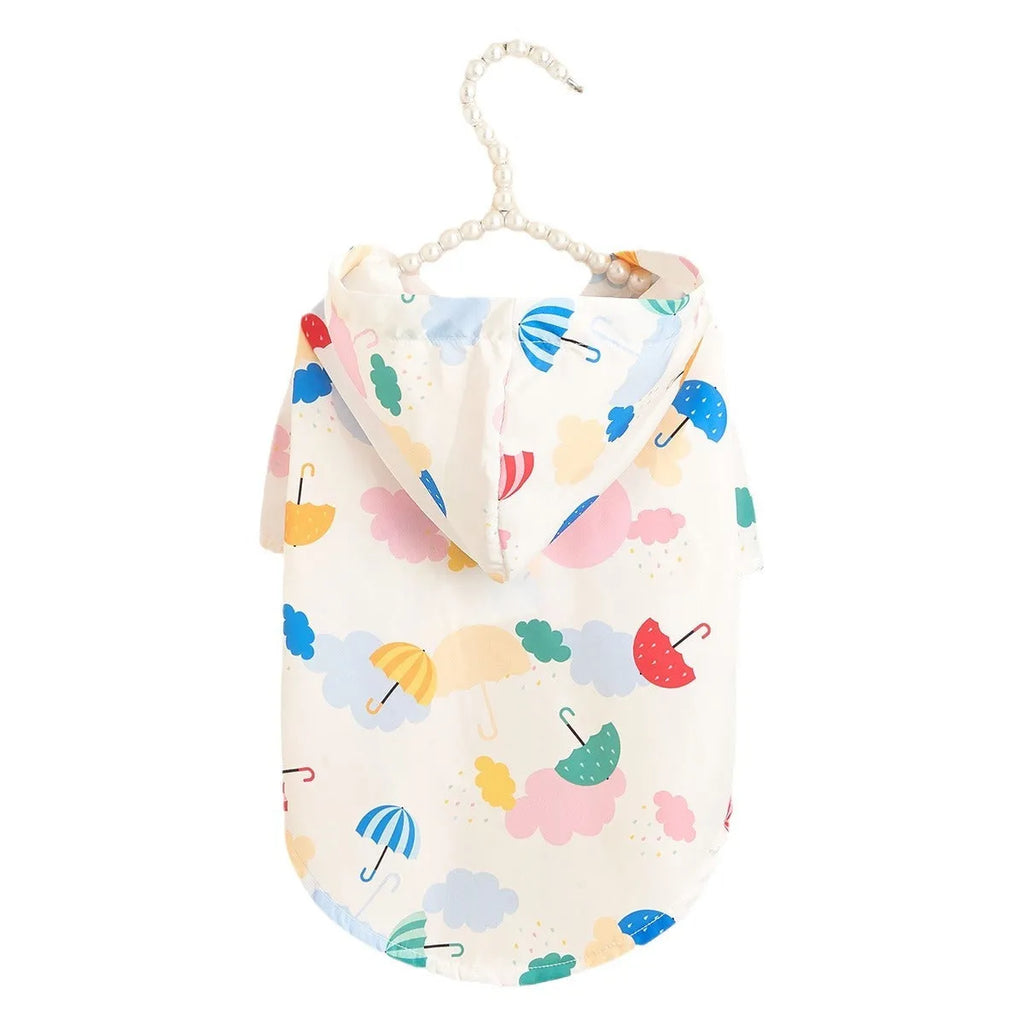 Dog wearing cartoon umbrella pattern polyester raincoat in waterproof fabric