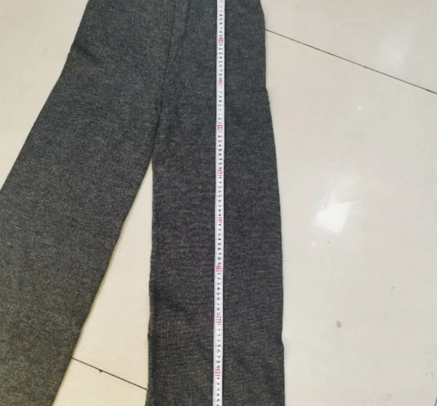 Women's solid colour acrylic trouser suit with long sleeve top and matching trousers