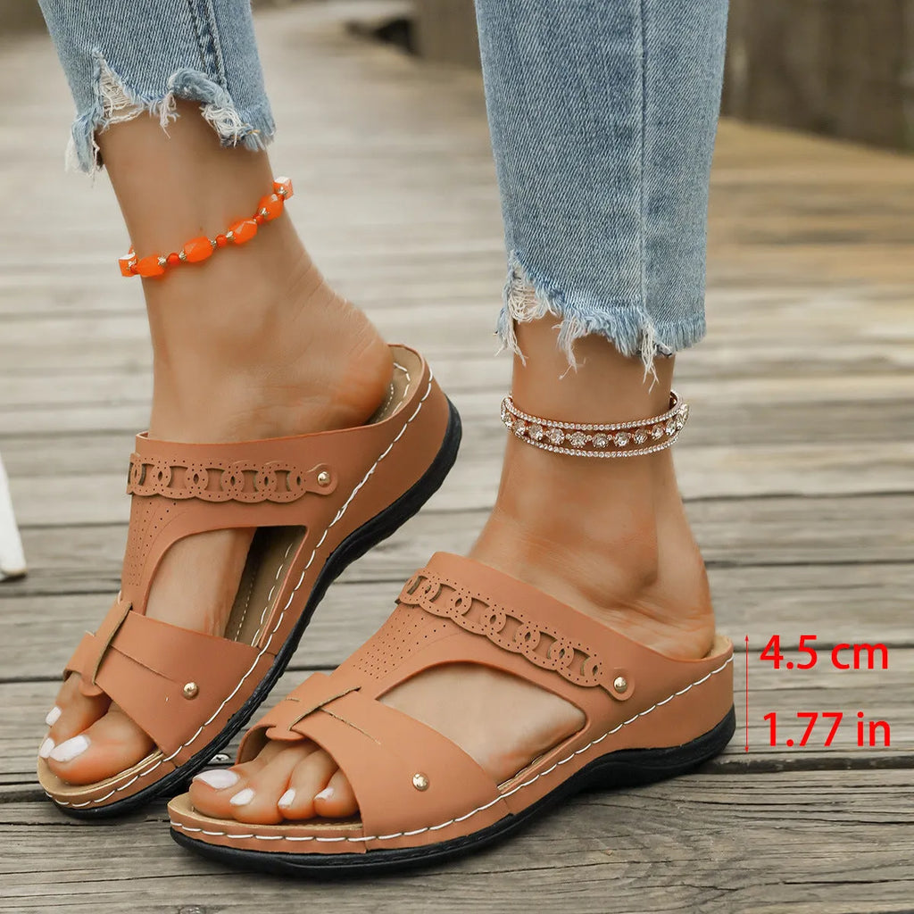 Roman style slope heel slippers with fish mouth toe design in PU leather and rubber sole