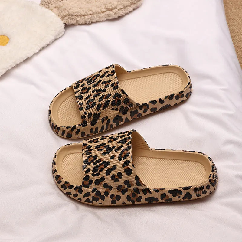 Women's leopard print EVA slippers with thick sole in black, pink, white zebra and khaki animal print colours