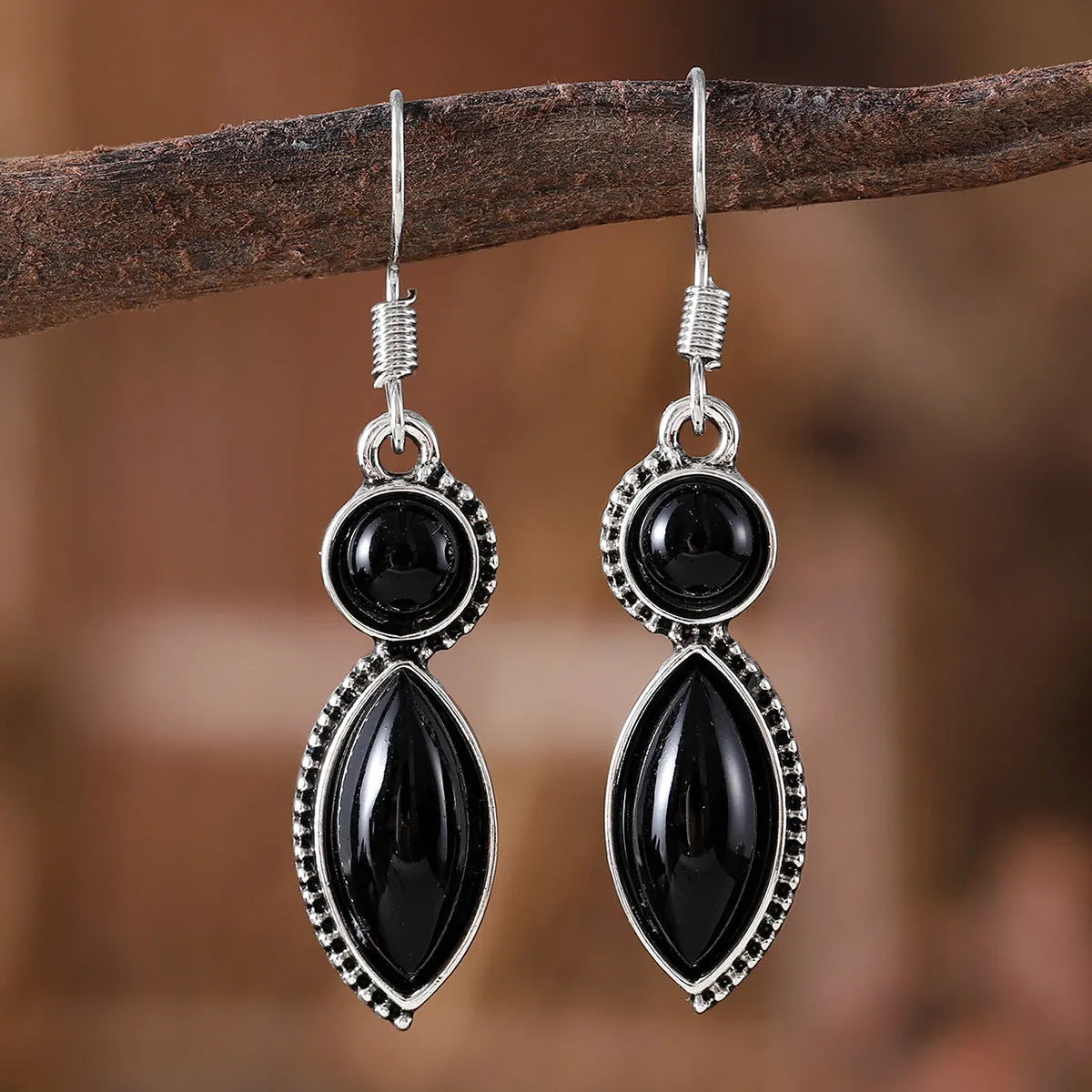 Vintage geometric zinc alloy earrings with electroplated black and purple finish and round decorative elements