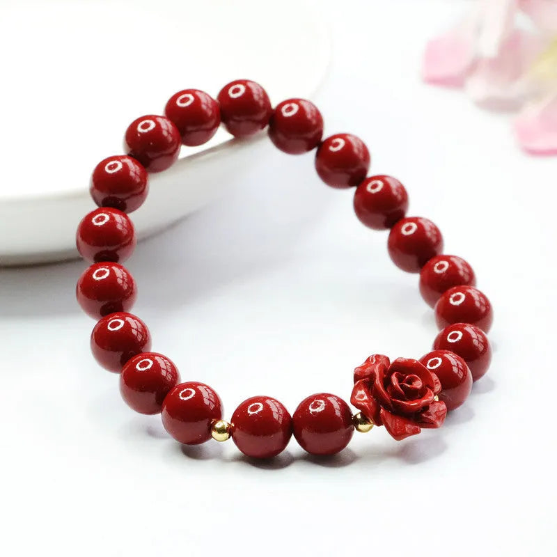 Natural cinnabar bracelet with 8mm rose-shaped beads in purple gold sandstone finish