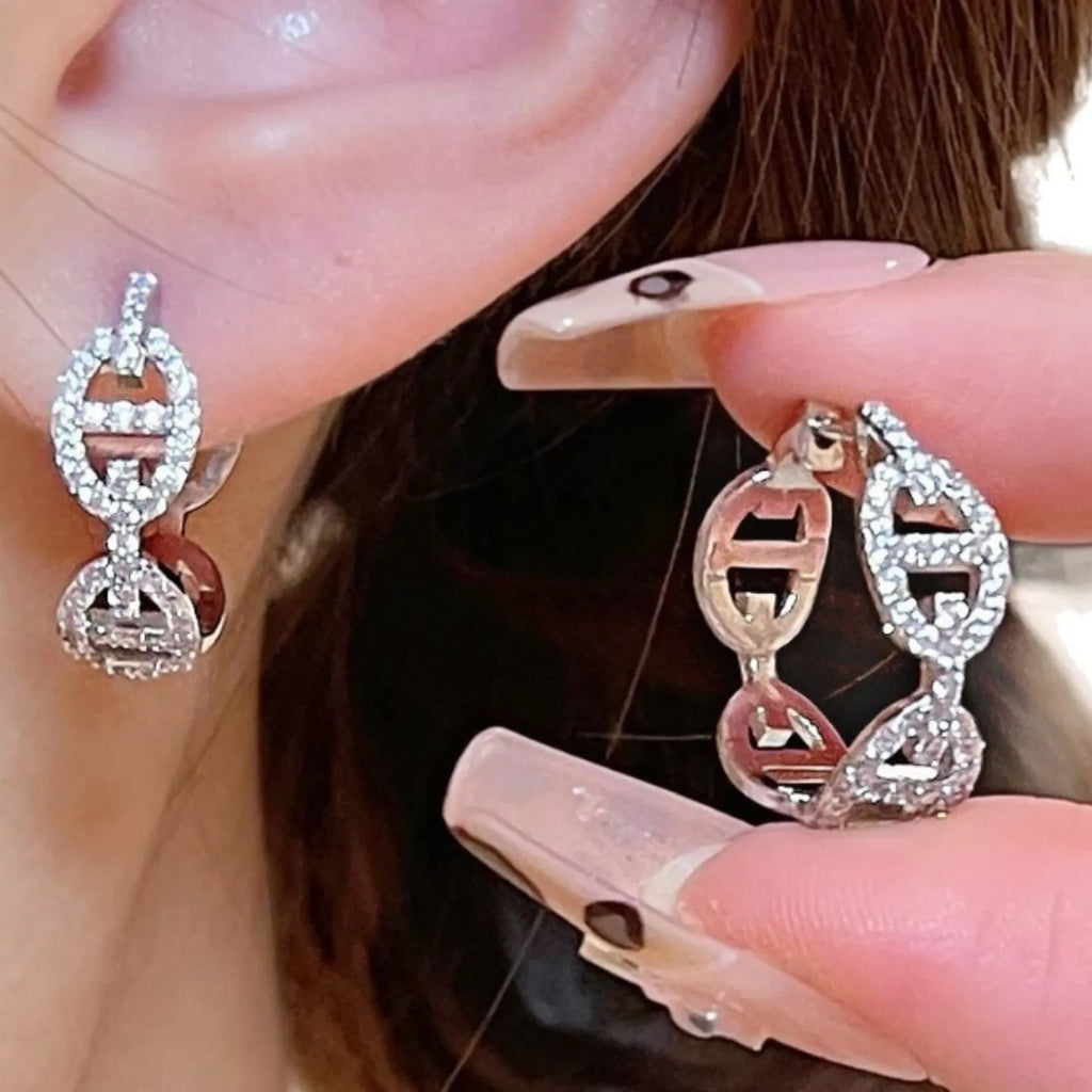 Women's thick gold plated diamond earrings in silver, gold and rose gold colours on copper base with electroplated finish