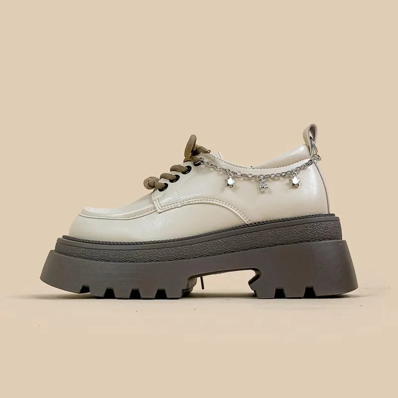 White women's Mary Jane platform shoes with thick chunky heel and front lace-up detail.