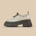 White women's Mary Jane platform shoes with thick chunky heel and front lace-up detail.