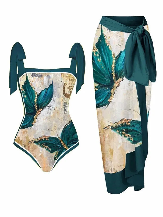 Women's floral printed two-piece swimsuit with matching skirt on a mannequin