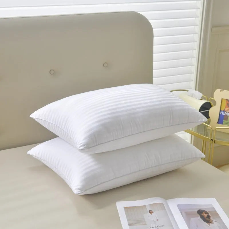 White cotton satin stripe feather pillow showing satin stripe detail on 99% cotton fabric.