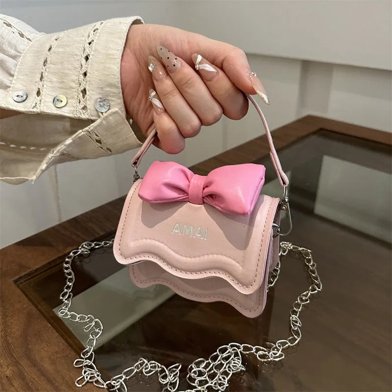 Women's mini crossbody bag in PU leather, available in several colour options with single strap