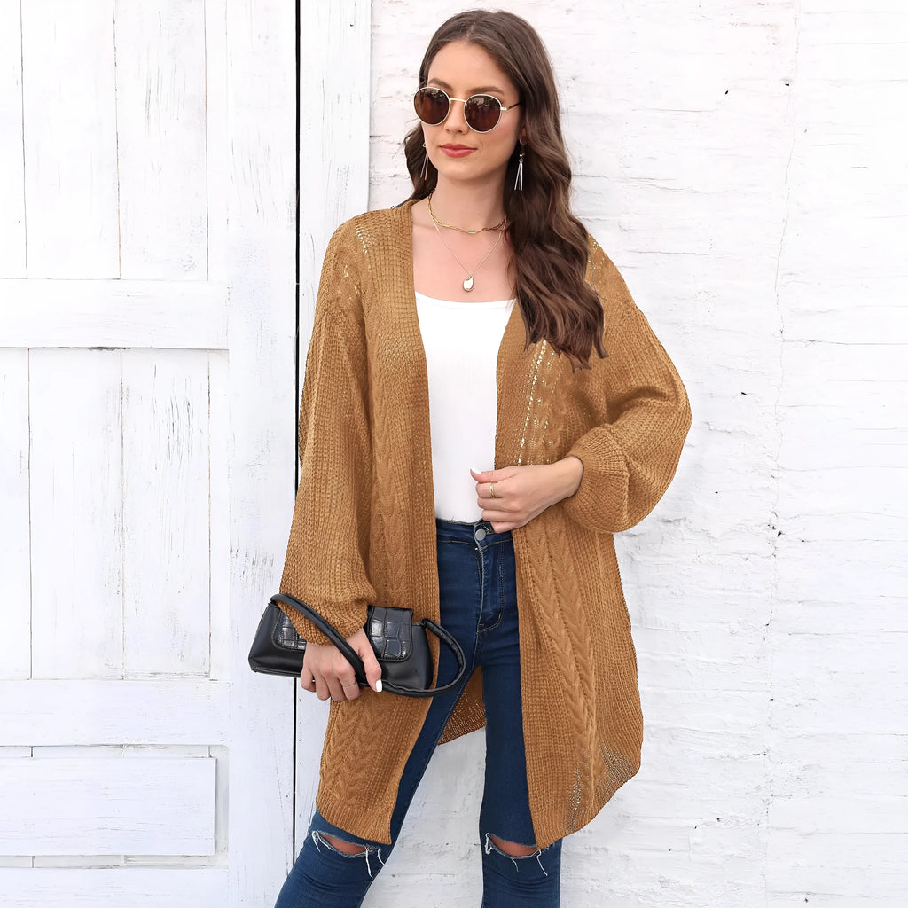 Women's loose fit acrylic sweater coat in army green, shown on a hanger.