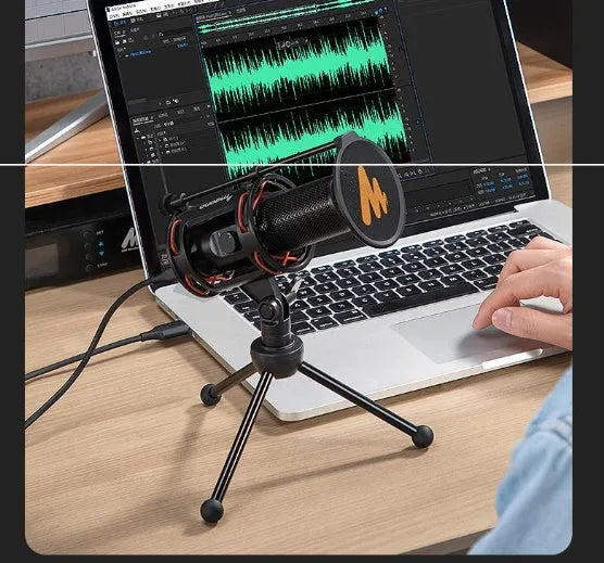 Black metal USB condenser recording microphone with 14mm diaphragm on desk with cable