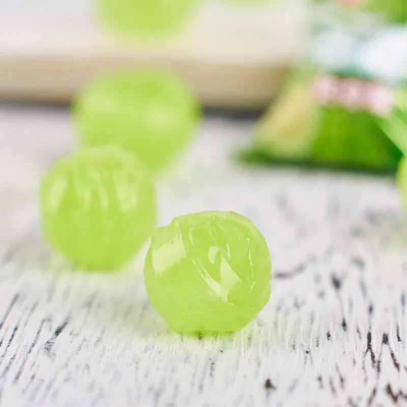 Three separate bags of hard candy: guava flavour, plum sugar flavour, and tangerine peel flavour.