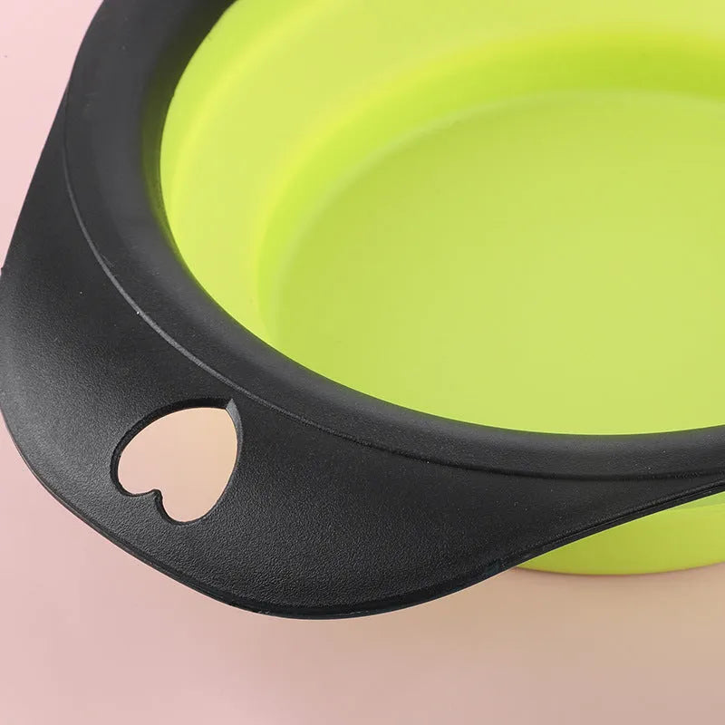 Silicone folding bowl for pets in black, collapsed flat for portable storage