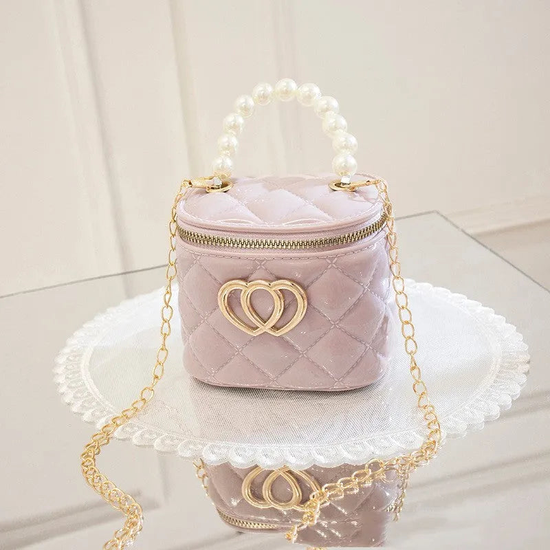 PVC bucket gel bag for women with heart pattern in choice of seven colours.