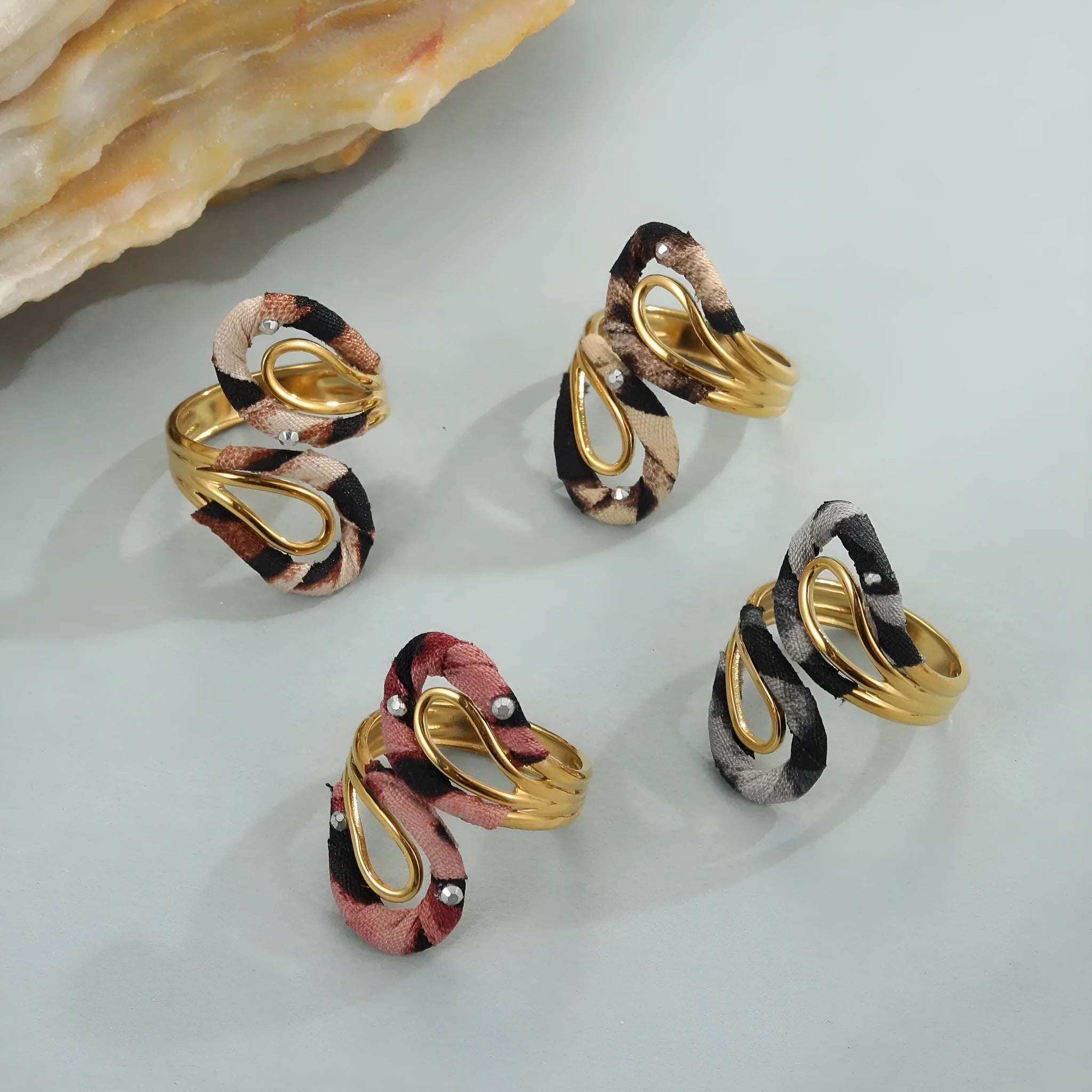 Open mouth stainless steel ring with geometric heart design and leopard print pattern