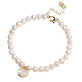 Women's freshwater pearl bracelet with fan-shaped pearl cluster and choice of elastic or chain fastening.
