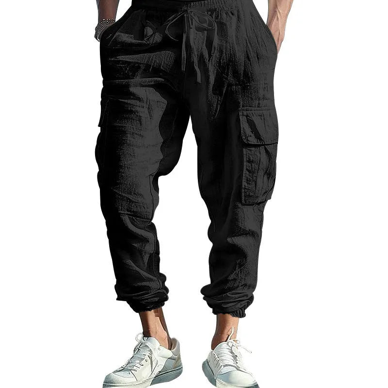 Men's loose fit linen casual trousers with ankle-tied tether and multiple pockets in an earthy colour.