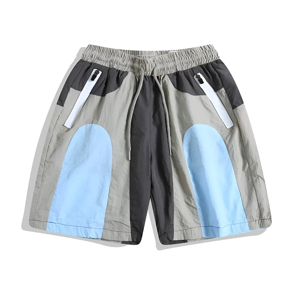 Blue patchwork quick-drying shorts with loose straight-leg styling and micro-elastic waistband