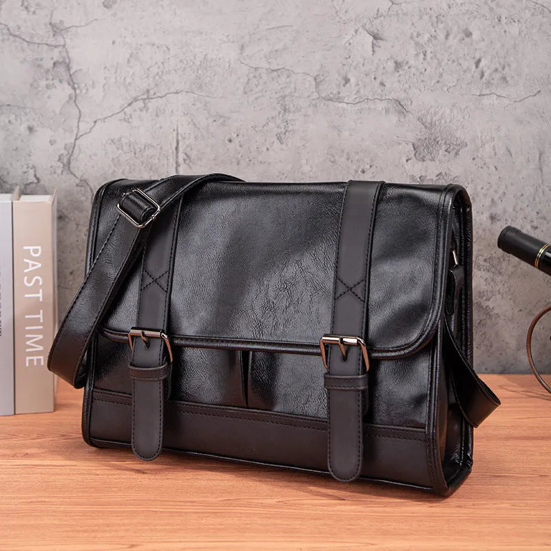 Black Korean-style anti-theft men's backpack made of pu leather with external sewing thread design.