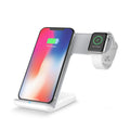 Black wireless phone charger with Type-C cable on desk