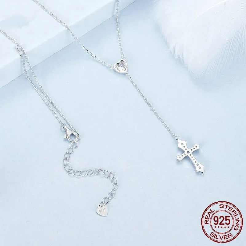 Silver cross necklace with V-neck pendant on an O-ring chain for women
