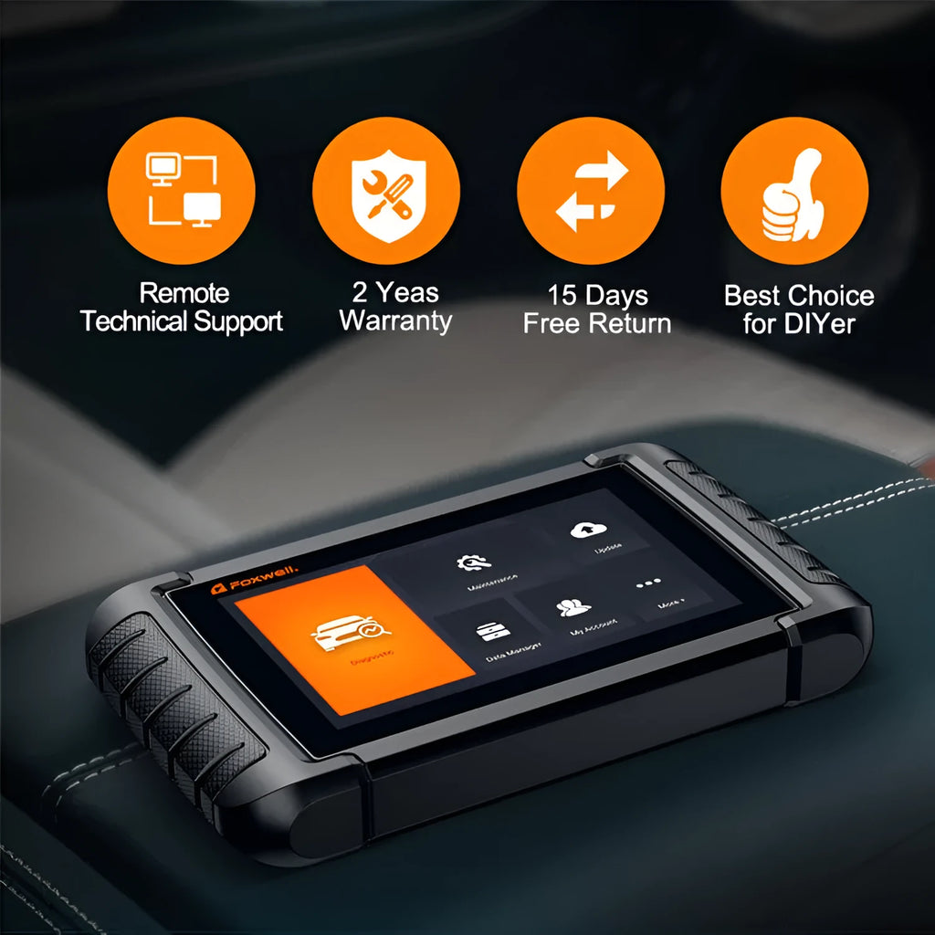 NT809 automotive full system diagnostic scanner with OBDII adapter and diagnostic cable on a workbench