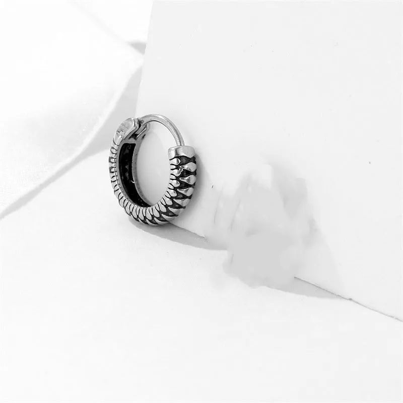 Silver geometric twist earrings with striped pattern on stainless steel