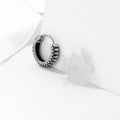 Silver geometric twist earrings with striped pattern on stainless steel