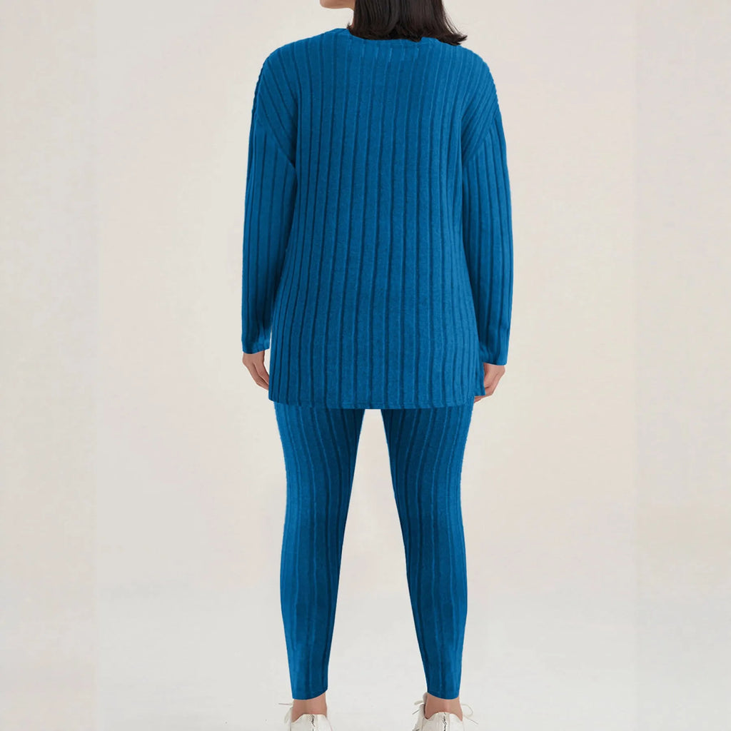 Women's black sunken stripe polyester two-piece loungewear set with regular sleeve top and matching trousers