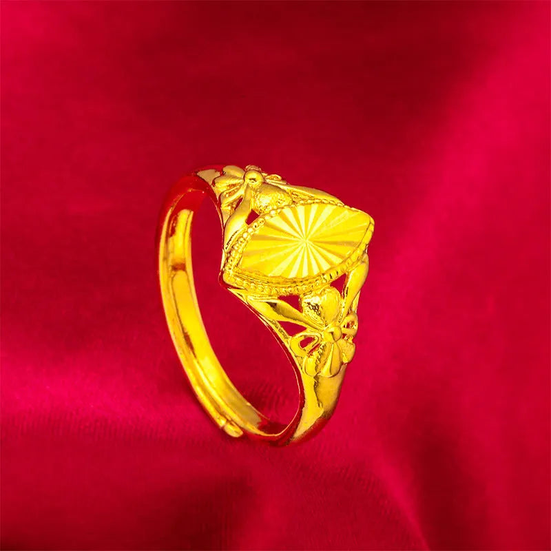 Alluvial gold electroplated brass ring with open diamond floral geometric design and textured band