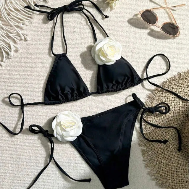 Black 3D flower lace drawstring bikini swimsuit with backless top and shorts on a model
