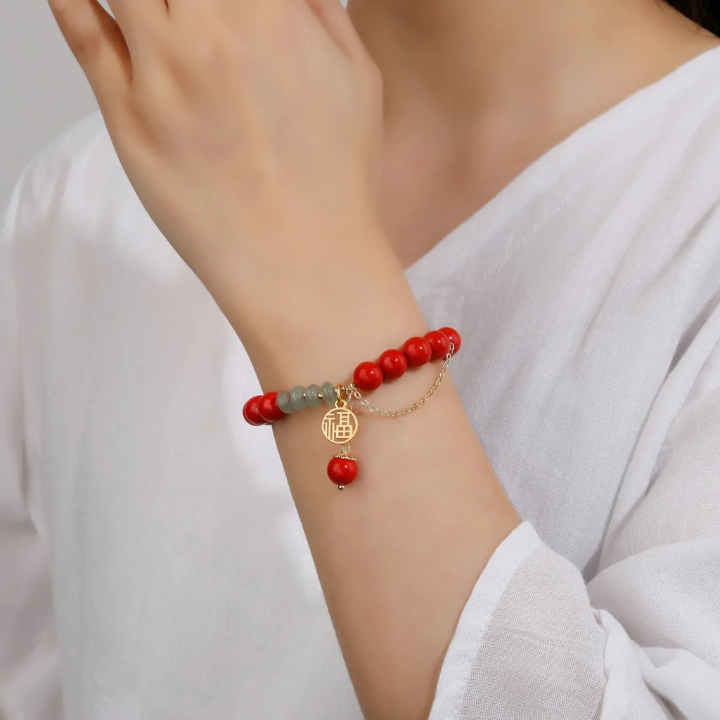 Retro women's cinnabar fu character bracelet with jade spacers and tassel, 8mm beads