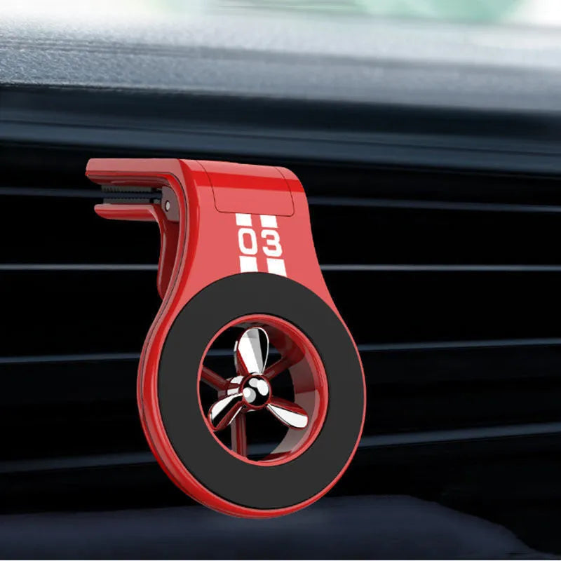 Magnetic car phone holder with fragrance slices attached to car air vent