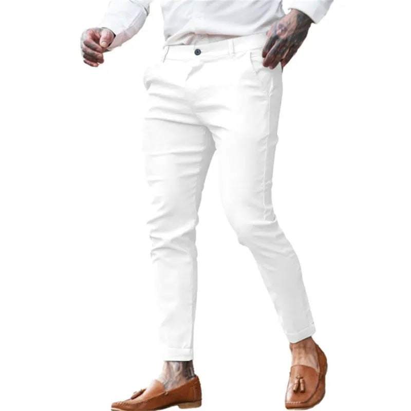 Men's slim fit pencil trousers in cotton twill stretch fabric on a hanger.