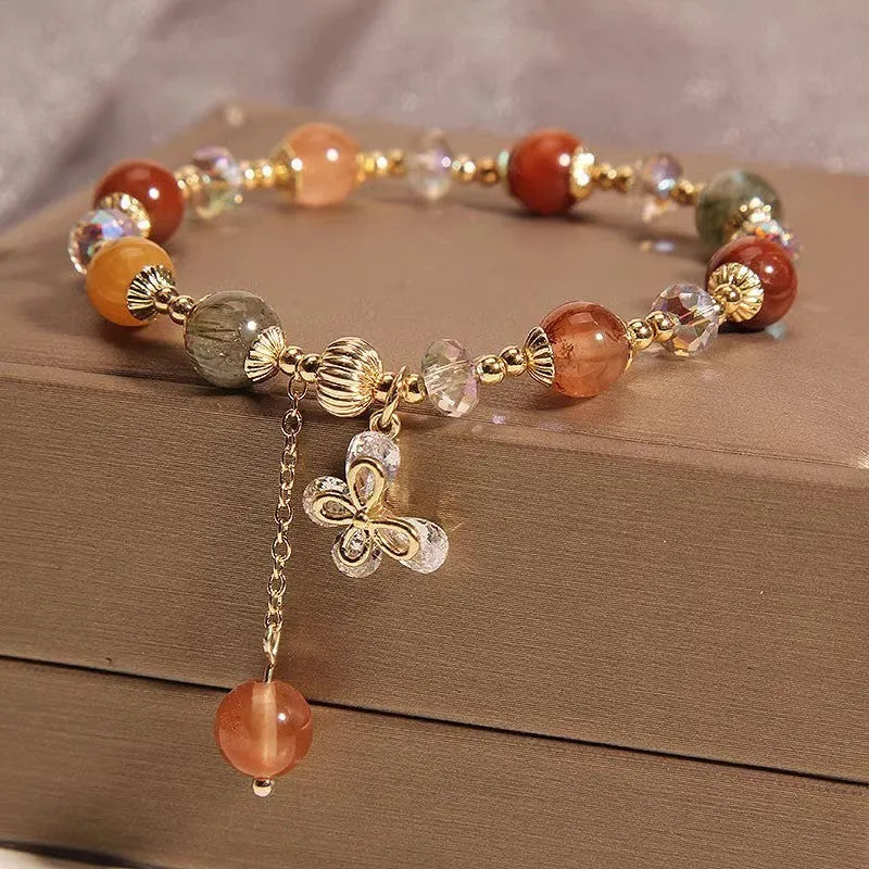 Single circle bracelet with natural coloured hair crystal beads in Korean style flower and insect designs